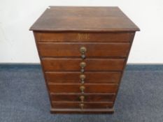 An Edwardian pine six drawer music chest