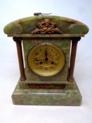 A 19th century onyx mantel clock with Corinthian column supports and key