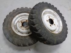 A pair of Landrover wheels with Olympic PTS Super mud plugga 7-50/16 tyres