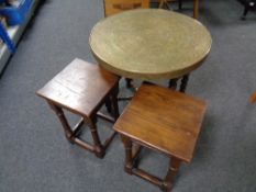 A pair of oak lamp tables together with an Eastern brass table on folding base