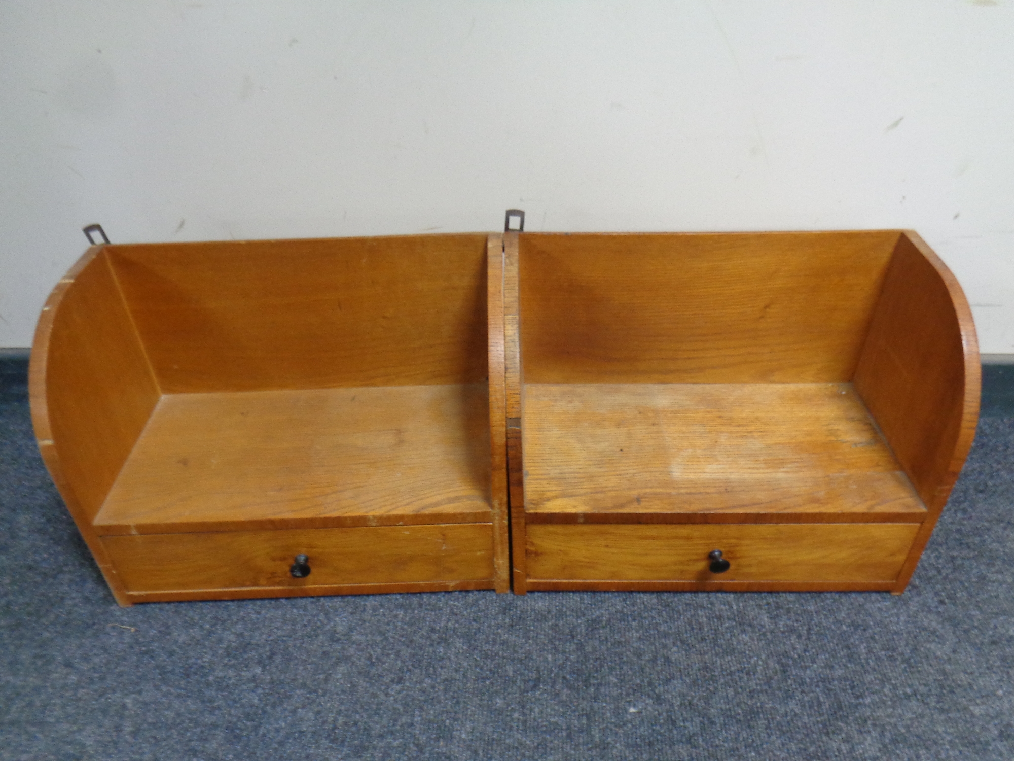 A pair of 20th century oak wall shelves fitted a drawer
