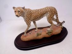 A Country Artist's figure of a Cheetah Agile Spirit on plinth