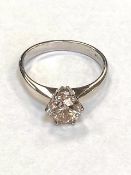 An 18ct white gold solitaire diamond ring, approximately 1.37ct, size N.