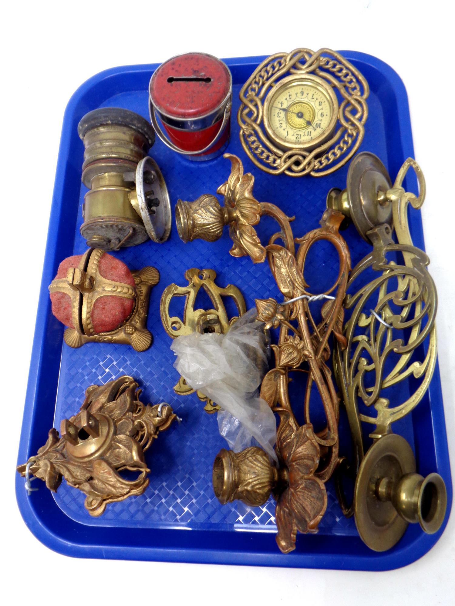 A tray of assorted antique and later metal wares, carbide lamp, brass sconces,