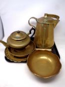 A tray of antique brass ware, kettle, bowls,