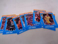 A collection of Fleer '90 All Stars Basketball including Patrick Ewing, Larry Bird,