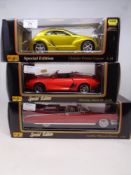 Three Maisto 1:18 Special Edition die cast vehicles - Chrysler Pronto Cruizer,