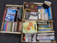 Three crates containing hardback and softback books to include novels, war,