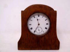 A Waltham Birmingham silver cased pocket watch 1909, in stand.