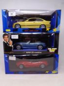 Three UT 1:18 die cast cars - Golden Eye 007 BMW Z3 Roadster,