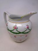 A nineteenth century Royal Doulton wash jug decorated with pink roses