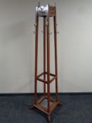 A twentieth century four sided hat and coat stand