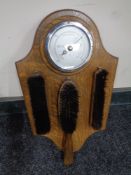 An Edwardian oak cased barometer with Smiths movement mounted on a plaque together with three