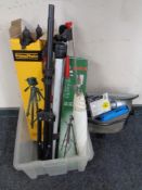 A box of photographic and camera tripod stands,