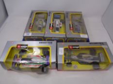 Five Burago 1:24 scale die cast racing cars - Williams FW 14, Formula USA Indy Team Race Champion,