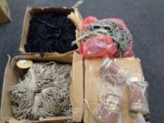 Four boxes of fabric trim