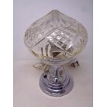 A twentieth century chrome table lamp with cut glass shade