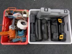 Two crates containing un-cased and cased power tools, Black and Decker,