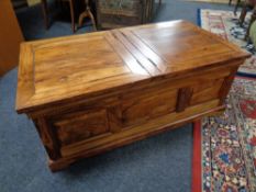 A Sheesham wood Ottoman coffee table, depth 61 cm, width 111 cm and height 43 cm.