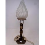 A 1930's Art Deco style metal table lamp with shade, with flame glass shade, height 46 cm.
