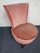 A twentieth century pink dralon upholstered bedroom chair