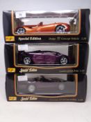 Three Maisto 1:18 Special Edition die cast vehicles - Dodge Concept vehicle,