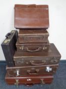 Seven vintage luggage and briefcases