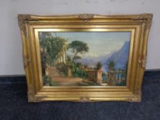 A print depicting a lake scene viewed from a villa in ornate gilt frame.