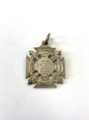 A silver medal marked Bayonet Cup,