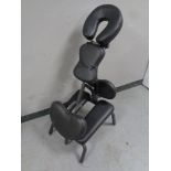 An adjustable massage chair