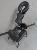 An adjustable massage chair