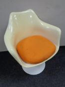 A mid century moulded plastic 'tulip' chair