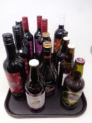 A tray containing fifteen assorted bottles of mulled wine, Irish cream,