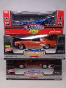 Two Ertl American Muscle Collection 1:18 die cast cars - 1969 Camaro Z-28 and 1969 Camaro SS396 and