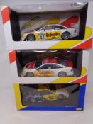 Three Team Rosberg Collection 1:18 scale model die cast racing cars to include Opel Colibra 1995