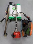 An Einhell petrol strimmer with attachments and harness together with a weed sprayer back pack