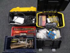 Four plastic tool boxes containing cable tester, electrical wire, hand tools, plum line,