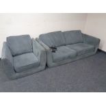 A contemporary two seater settee with armchair in dark grey fabric