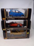 Three Maisto 1:18 Special Edition die cast vehicles - Mercedes Benz A Class,