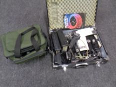 An Hakubea metal case containing a large quantity of Vivitar camera accessories,