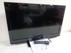 A Panasonic Vierra 32 inch LCD TV with lead and instructions