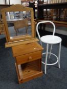 A pine bedside stand fitted with a drawer together with a pine dressing table mirror and tubular