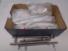 A box of stainless steel T-bar cabinet handles
