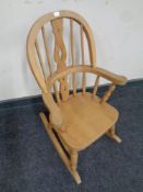 A child's farmhouse style rocking chair