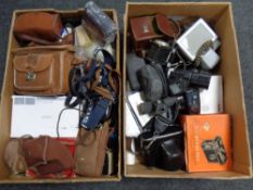 Two boxes of a large quantity of cameras, camera accessories,