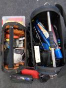 Two tool bags containing a quantity of assorted hand tools, tape measures, rawl plugs, cable ties,