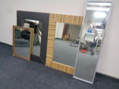 Four assorted framed mirrors