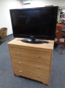 A contemporary three drawer chest together with a Blaupunkt 32 inch LCD TV
