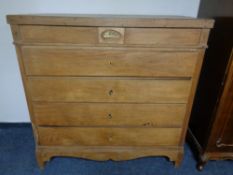 A 19th century oak five drawer chest on base
