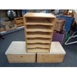 Two pine upholstered storage boxes together with a filing shelf
